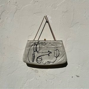 Off white leather wearable art clasp clutch purse